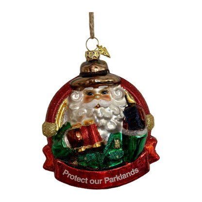 Defend Our Parklands Santa blown-glass ornament on white